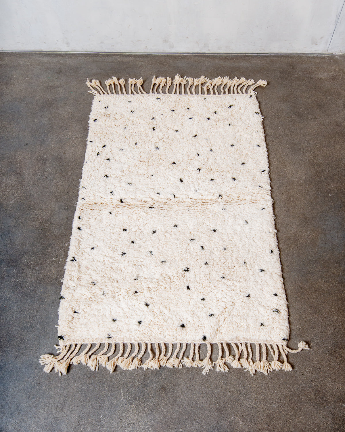 Modern, designer, handcrafted Berber rug from Morocco. Beniourain carpet with beautiful colours and patterns and fluffy wool texture.